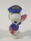 United Features Syndicate Peanuts Valentine's Day Mailman Snoopy Holding Pink Heart Shaped Letter 2 1/2" Tall PVC Toy Figure