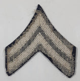 Vintage US Army Corporal Rank Dark Grey Thread Chevrons on Dark Blue 2 1/2" x 3 1/4" Shoulder Fabric Patch Badge