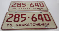 Set of Matching Vintage 1975 Saskatchewan Red Lettering White Vehicle License Plate Metal Tags 285 640