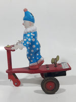 Vintage Roli Zoli Blue Clown with White Spots on Red Tricycle Bike 5 1/2" Tall Tin Metal Key Wind Up Toy Made in China
