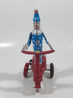 Vintage Roli Zoli Blue Clown with White Spots on Red Tricycle Bike 5 1/2" Tall Tin Metal Key Wind Up Toy Made in China