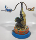 Vintage Elephant Carry Plane 10 1/2" Tall Tin Metal Key Wind Up Toy Made in China