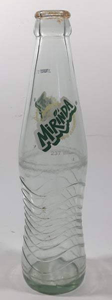 Mirinda 8 3/4" Tall 237mL Embossed Clear Glass Soda Pop Bottle