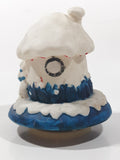 1998 Y. D. CO. Santa Claus White and Blue Snow Covered Round House 5 1/2" Tall Plastic Wind Up Rotating Musical Ornament