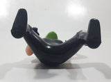 Black and Green Character with Helmet In Riding Pose 3 3/4" Tall Toy Figure