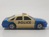 Unknown Brand Police Cruiser Cops Blue and White Plastic Die Cast Toy Car Vehicle