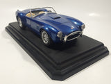 Burago 1965 Ford AC Cobra 427 Convertible Blue 1/24 Scale Die Cast Toy Car Vehicle with Opening Doors and Hood on Display Stand