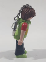 2006 Geobra Playmobil Speed S Boy in Green and Red with Black Pants 3" Tall Toy Figure Keychain