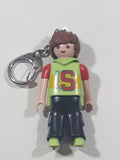 2006 Geobra Playmobil Speed S Boy in Green and Red with Black Pants 3" Tall Toy Figure Keychain