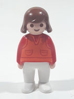 1990 Geobra Playmobil Girl in Red and Orange Top and White Pants 2 3/4" Tall Toy Figure