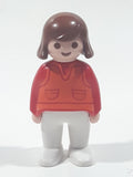 1990 Geobra Playmobil Girl in Red and Orange Top and White Pants 2 3/4" Tall Toy Figure