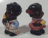 Rare Antique Black Americana Boy and Girl Holding Corn Cobs Cork Plug Ceramic Salt and Pepper Shakers