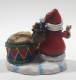 Santa Claus with Teddy Bear and Drum 3 1/4" Tall Resin Candle Holder