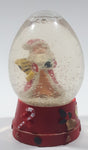 Santa Claus 4 1/4" Tall Red Resin Snow Globe