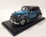 Jada Toys Street Low 1947 Chevrolet Fleetline Blue 1/24 Scale Die Cast Toy Car Vehicle with Opening Hood Trunk and Doors On Display Stand