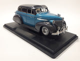 Jada Toys Street Low 1947 Chevrolet Fleetline Blue 1/24 Scale Die Cast Toy Car Vehicle with Opening Hood Trunk and Doors On Display Stand