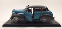 Jada Toys Street Low 1947 Chevrolet Fleetline Blue 1/24 Scale Die Cast Toy Car Vehicle with Opening Hood Trunk and Doors On Display Stand