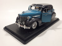 Jada Toys Street Low 1947 Chevrolet Fleetline Blue 1/24 Scale Die Cast Toy Car Vehicle with Opening Hood Trunk and Doors On Display Stand