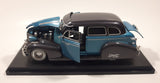 Jada Toys Street Low 1947 Chevrolet Fleetline Blue 1/24 Scale Die Cast Toy Car Vehicle with Opening Hood Trunk and Doors On Display Stand