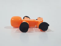 Orange 2 1/4" Tall Plastic Figure with Suction Cup Hands and Feet