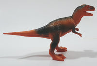 S.H. Orange and Green Raptor 2 3/4" Tall Dinosaur Toy Figure