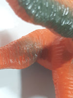 S.H. Orange and Green Raptor 2 3/4" Tall Dinosaur Toy Figure