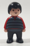 1990 Geobra Playmobil Boy with Black Hair in Red Shirt with Grey Vest and Black Pants 2 1/4" Tall Toy Figure