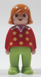 1990 Geobra Playmobil Youth Girl with Light Brown Hair in Red Sweater and Green Pants 2 3/4" Tall Toy Figure