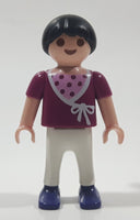1995 Geobra Playmobil Girl with Black Hair in Purple Top and White Pants 2" Tall Toy Figure