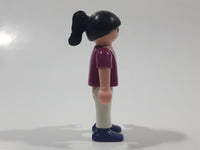 1995 Geobra Playmobil Girl with Black Hair in Purple Top and White Pants 2" Tall Toy Figure
