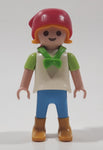 1992 Geobra Playmobil Girl with Blonde Hair Red Bonnet in White and Green Top and Blue Pants 2 1/8" Tall Toy Figure