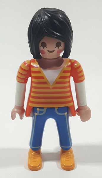 1992 Geobra Playmobil Woman with Black Hair Orange and Yellow Striped Sweater Over White Top and Blue Jean Pants 3" Tall Toy Figure
