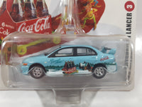 2005 Playing Mantis Johnny Lighting Coca Cola Brand Holiday Automents #3 2003 Mitsubishi Lancer Light Blue Die Cast Toy Car Vehicle New in Package
