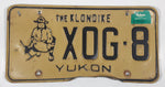 1989 Yukon The Klondike Man Panning Gold Themed Yellow Metal Vehicle License Plate Tag X0G 8