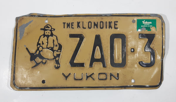 1989 Yukon The Klondike Man Panning Gold Themed Yellow Metal Vehicle License Plate Tag ZA0 3