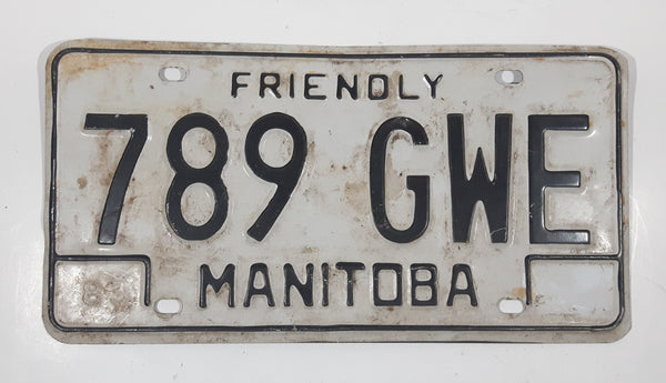 Friendly Manitoba White With Black Letters Metal Vehicle License Plate Tag 789 GWE