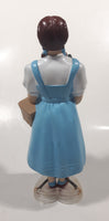 1995 Standard Doll Co. Turner Entertainment The Wizard Of Oz Dorthy Holding Toto and a Basket 8" Tall Figure on Heart Shaped Base