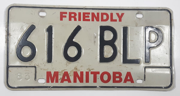 1983 Friendly Manitoba White With Black and Red Letters Metal Vehicle License Plate Tag 616 BLP