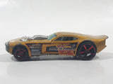 2007 Hot Wheels Nitro Doorslammer Aston Martin Metalflake Gold Die Cast Toy Car Vehicle