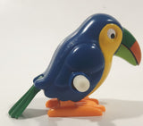 Hans Blue and Yellow Toucan Bird Wind Up 1 5/8" Tall Plastic Toy Figure