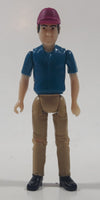 Nylint Driver Man in Blue Shirt Tan Pants and Purple Cap Hat 3 1/8" Tall Toy Action Figure