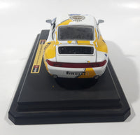 Burago Porsche 911 Carrera Racing #1 Pirelli Mobil White 1/24 Scale Die Cast Toy Car Vehicle with Opening Doors and Rear Hood on Base