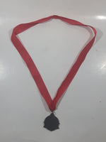 Canadian Outback Adventures Brass Medal Award with Red Ribbon