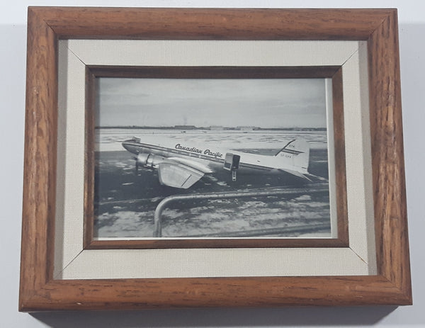 Vintage 1940s Canadian Pacific 274 CF-CPX Douglas C-47 Skytrain (DC-3) with Northwest Industries Ltd In The Background 4 1/2" x 6 1/2" Wood Framed Black and White Photograph Picture