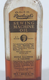 Antique Rawleigh's Sewing Machine Oil 4 1/2 Fluid Oz 6 1/2" Tall Glass Bottle with Paper Label