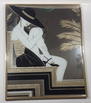 Vintage 1980s Art Deco Style Fashionista Vogue Glamourous Woman Sitting with Black Hat and Leg Up Gold Foil 16 1/4" x 20" Thin Metal Framed Wall Mirror Art Picture