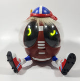 1999 Playmates Ooglies Gridiron Football Shaped 5 1/2" Tall Light Up Eyes Animated Moving Shaking Sound Making Toy Figure